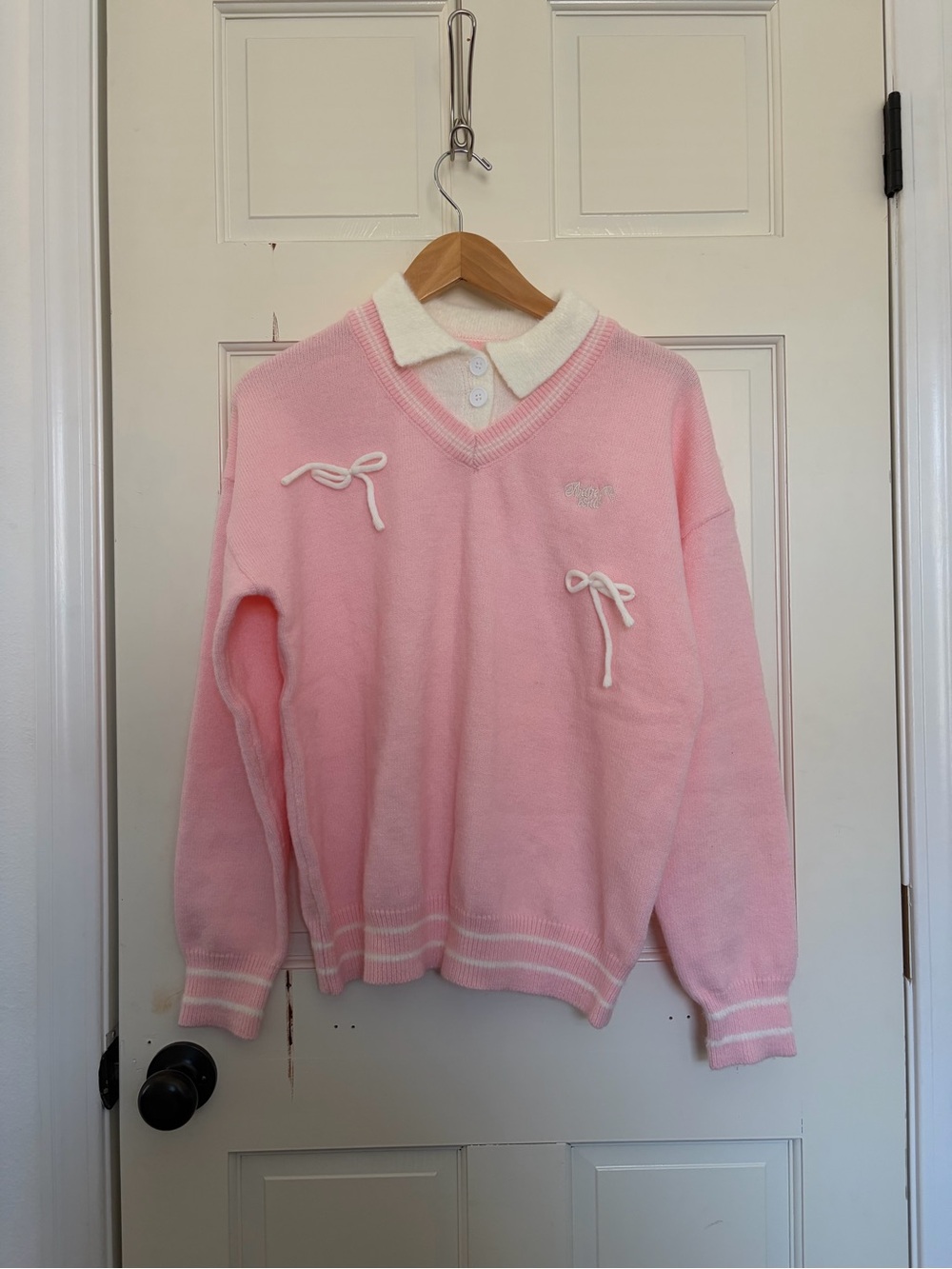 Pink V-Neck Sweater with White Collar & Bow Details